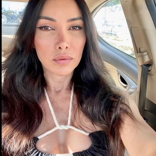 J B