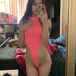 K^-^