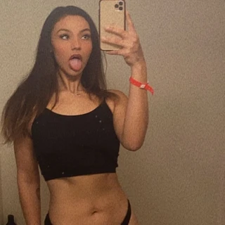 T.