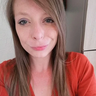 J T